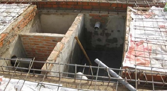 Xây dựng bể tự hoại bằng bê tông cốt thép đúc an toàn, chắc chắn