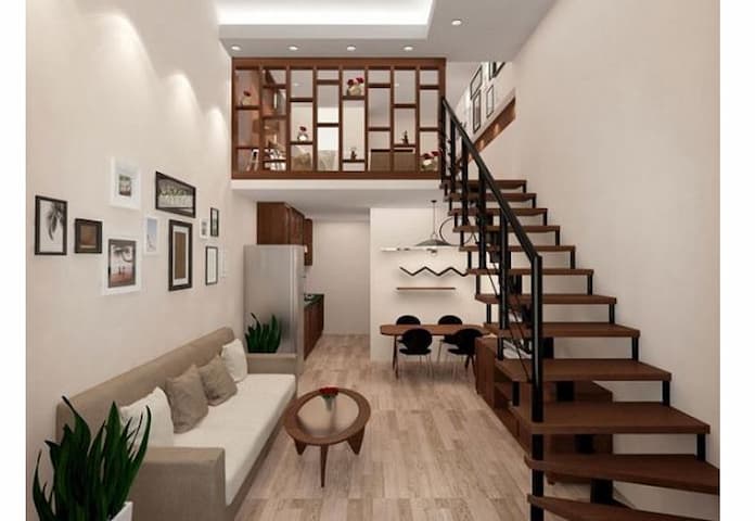 Ảnh 19: Cầu thang nằm dọc theo ngôi nhà sẽ giúp không gian phòng khách thông thoáng hơn 