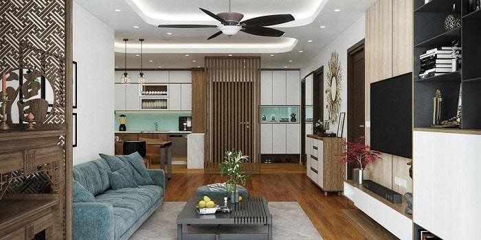 Thiết kế nội thất cho căn chung cư gắn liền phòng khách và bếp, tạo ra khoảng cách giữa khu vực nấu ăn và sinh hoạt bằng cách bố trí bàn ăn.