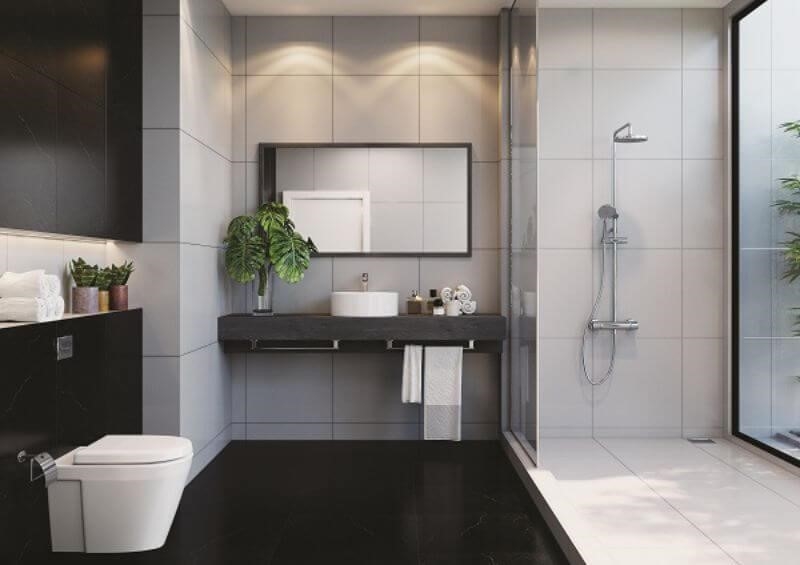 Phòng tắm nhỏ được thiết kế với nội thất hiện đại, đa chức năng.