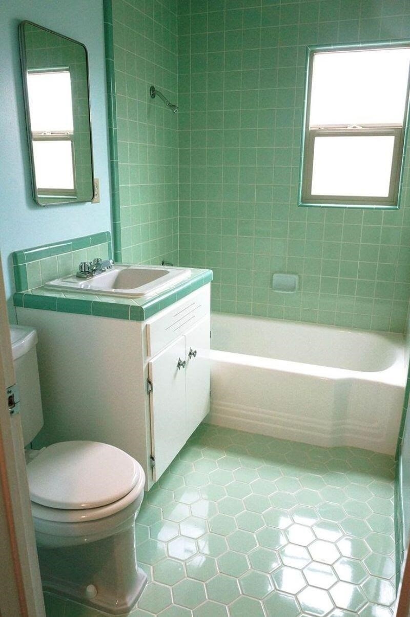 Phòng tắm được thiết kế đẹp với tông màu xanh bạc hà rất ấn tượng.